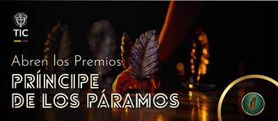 Mano coloca una pluma dorada sobre mesa iluminada; texto anuncia que MinTIC se suma a Premios Príncipe de los Páramos y abre convocatoria